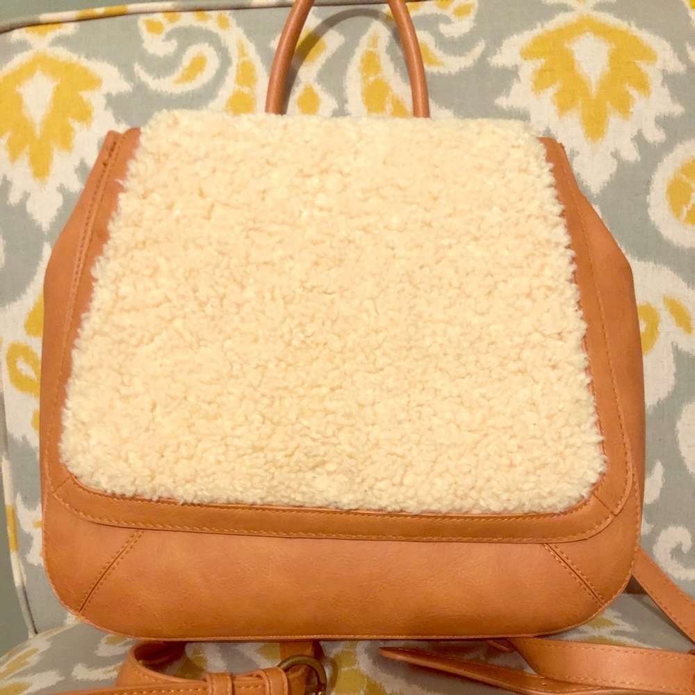Faux leather Sherpa topped backpack used once!